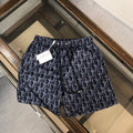 BLUE MONOGRAM PRINT SWIM SHORTS