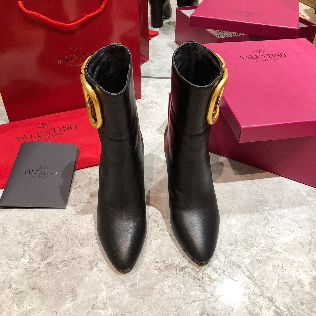 ELEGANT ANKLE BOOTS WITH STATEMENT GOLD V DETAIL