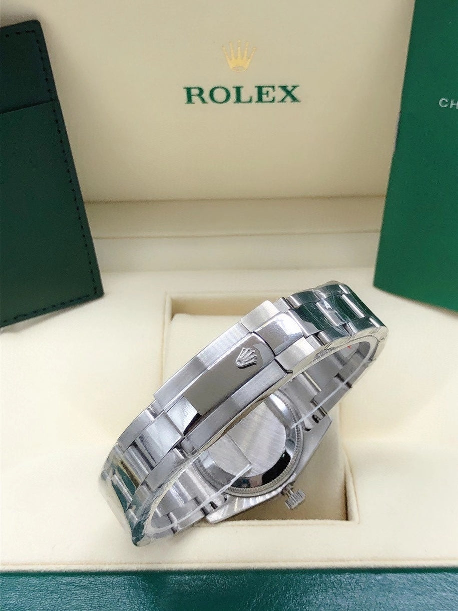 PINK DIAL STAINLESS STEEL DATE WATCH WITH FLUTED BEZEL