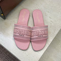 PINK LOGO EMBOSSED SLIDE SANDALS
