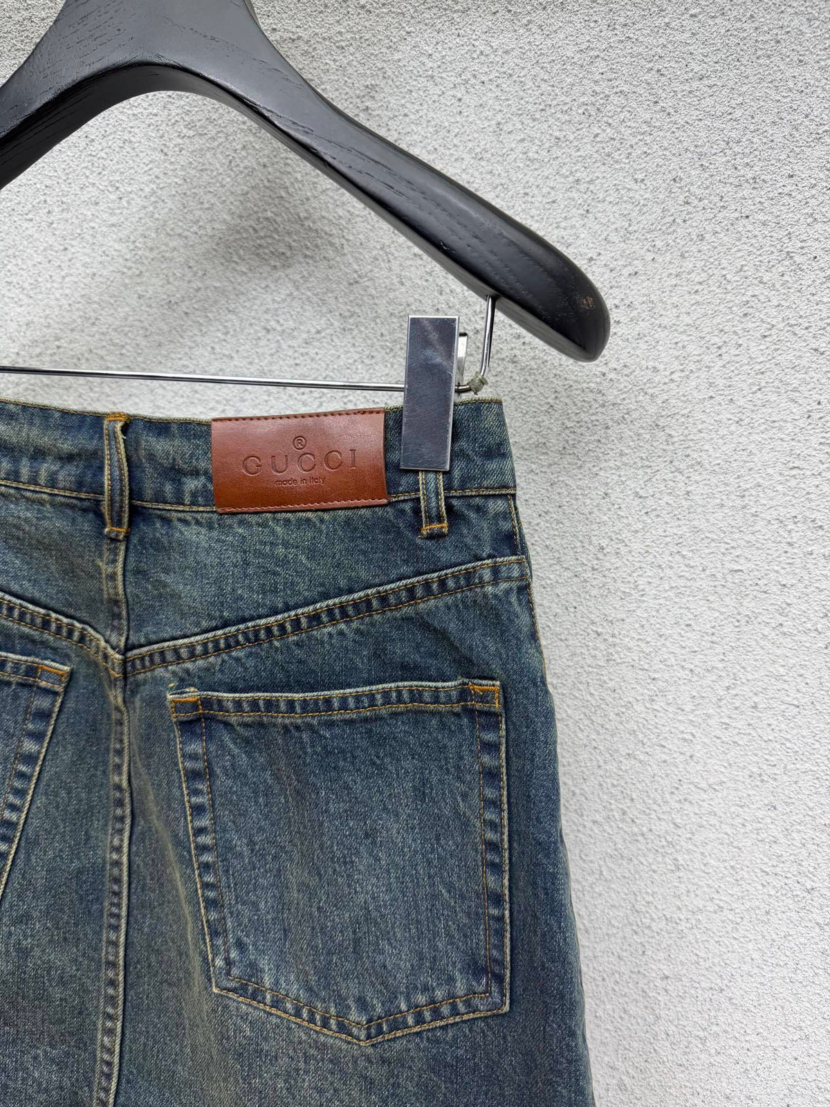 DARK BLUE DENIM MINI SKIRT WITH METAL DETAIL
