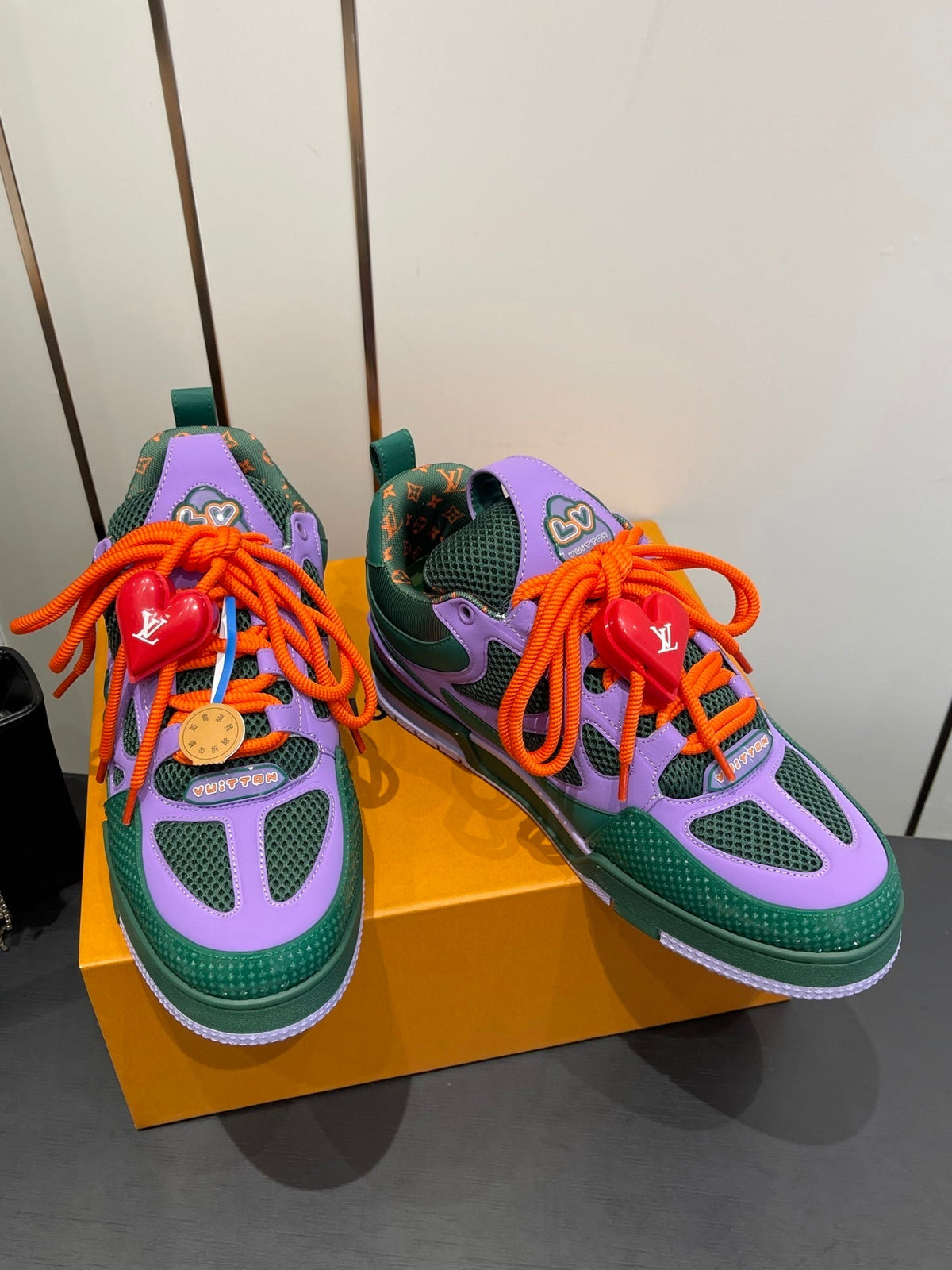 BOLD COLORBLOCK SNEAKERS WITH OVERSIZED LACES AND CHARM DETAIL