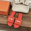 CORAL SUEDE BUCKLE SLIDE SANDALS
