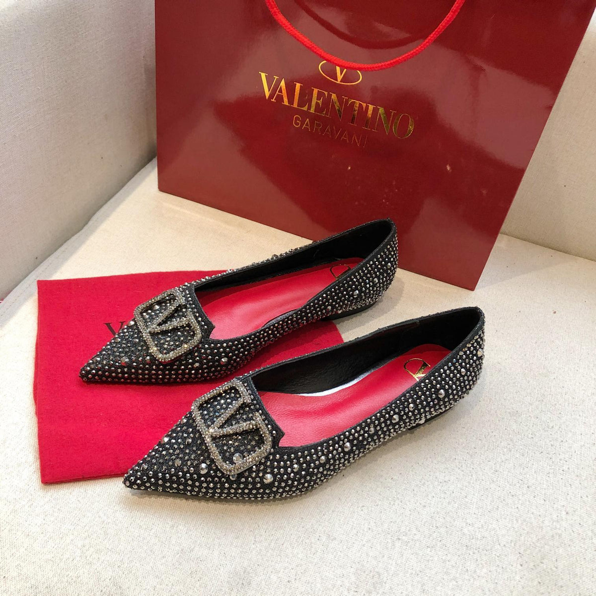 CRYSTAL EMBELLISHED POINTED FLATS WITH SIGNATURE BUCKLE