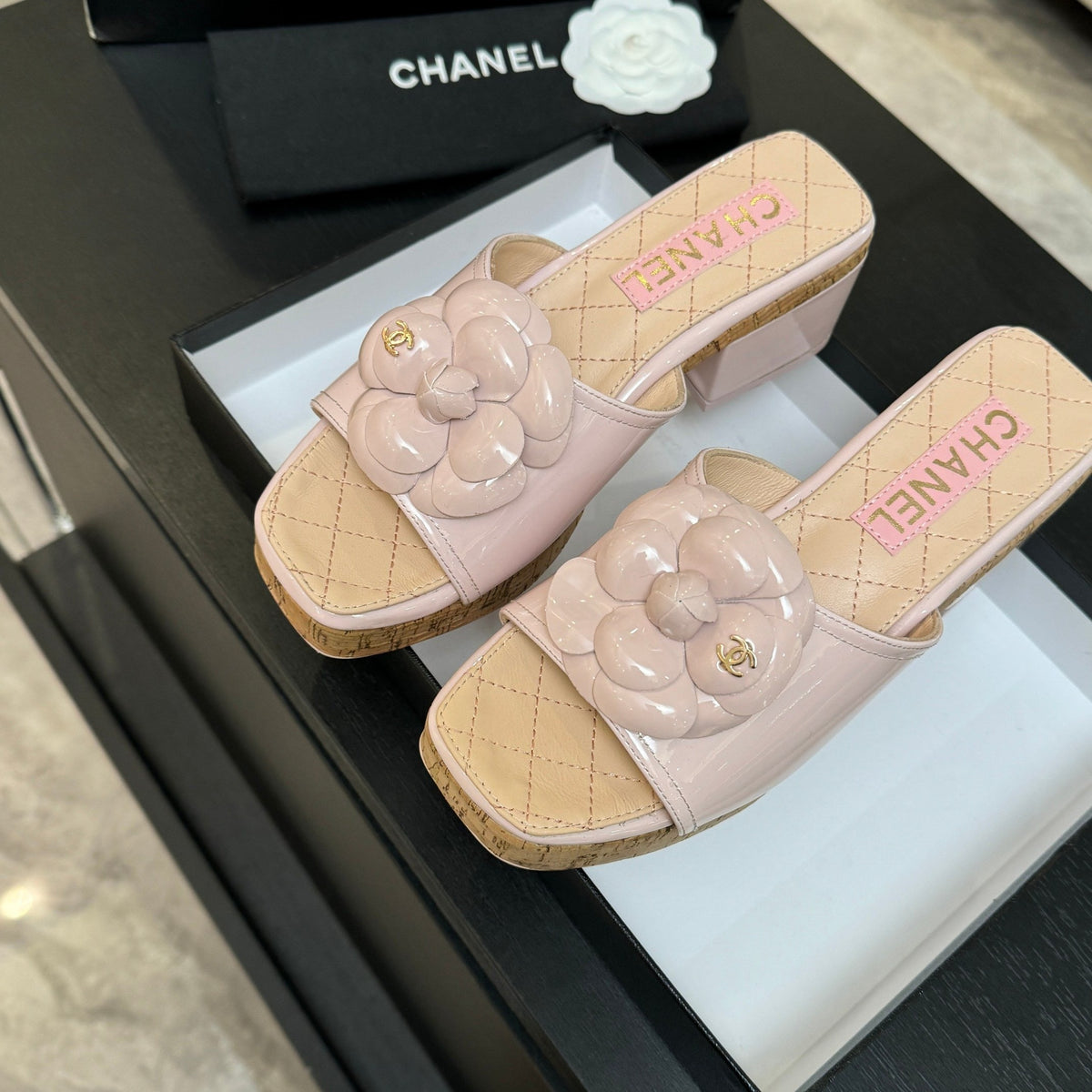 BLUSH QUILTED PLATFORM SLIDE SANDALS WITH CAMELLIA DETAIL