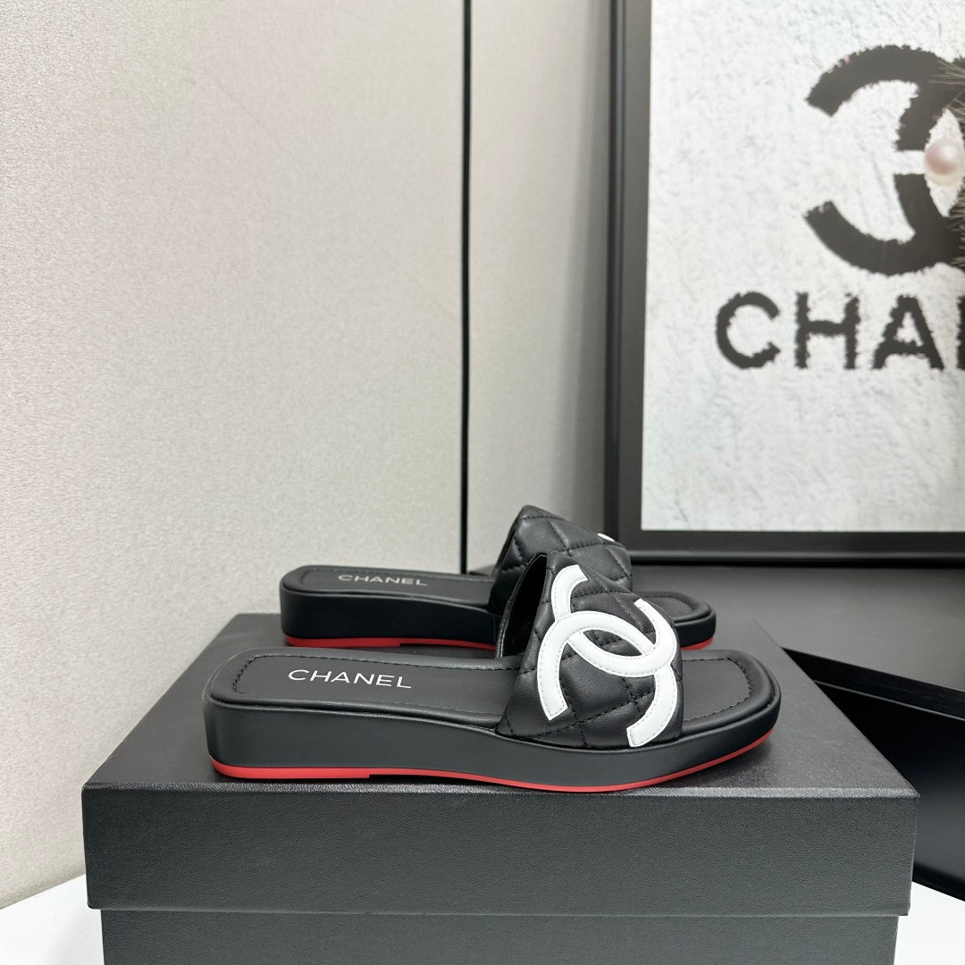 QUILTED LOGO PLATFORM SLIDE SANDALS