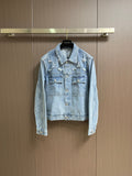 DISTRESSED DENIM TRUCKER JACKET WITH EMBROIDERED DETAILS