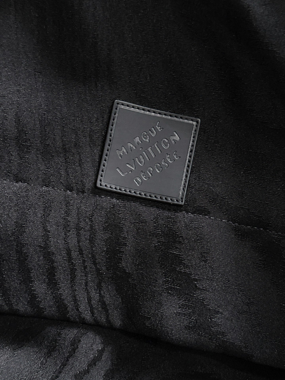 TEXTURED BLACK HOODED JACKET