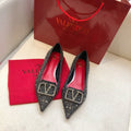 CRYSTAL EMBELLISHED POINTED FLATS WITH SIGNATURE BUCKLE
