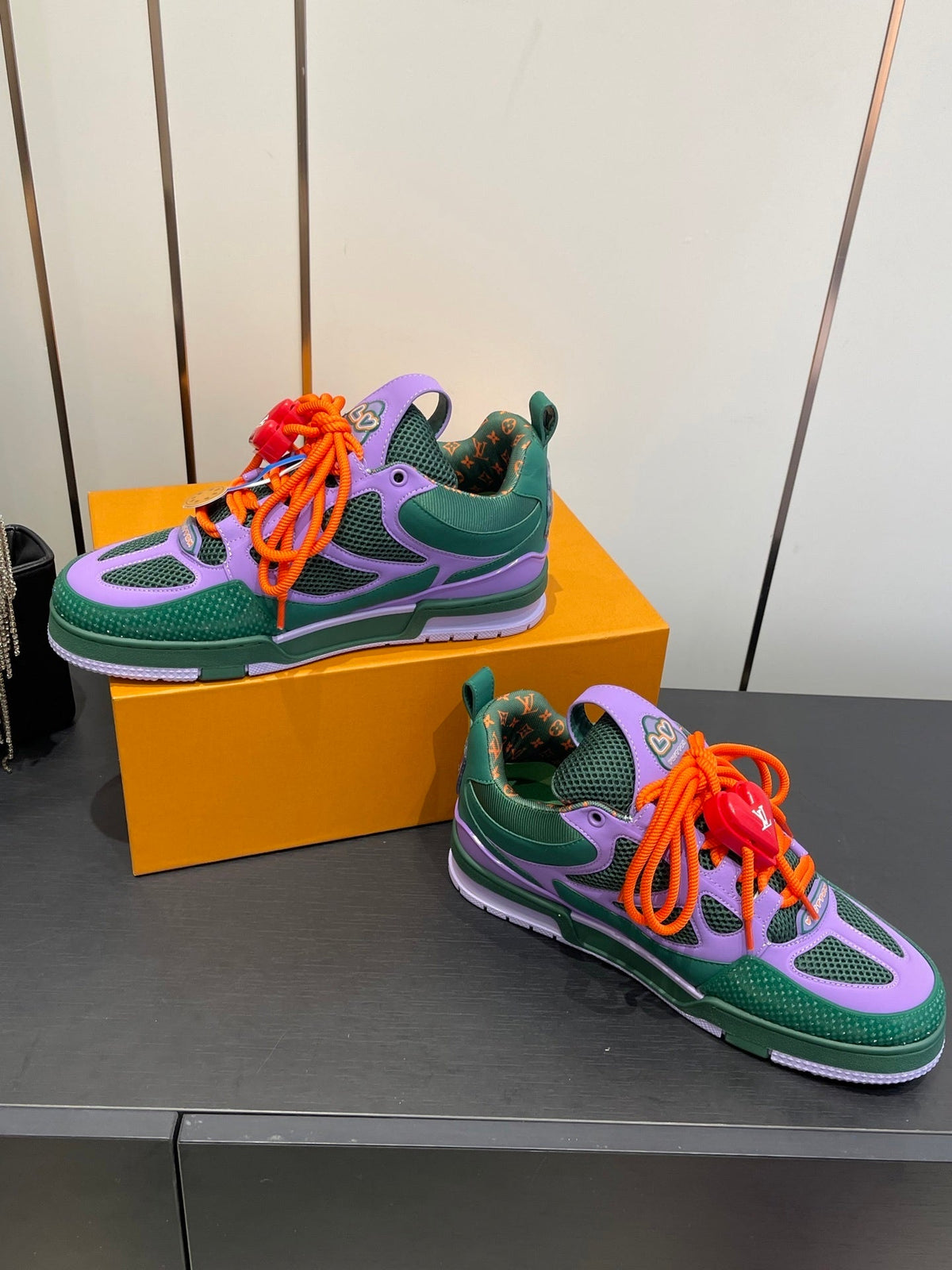 BOLD COLORBLOCK SNEAKERS WITH OVERSIZED LACES AND CHARM DETAIL