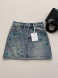 BLUE DENIM MINI SKIRT WITH FLORAL EMBROIDERY