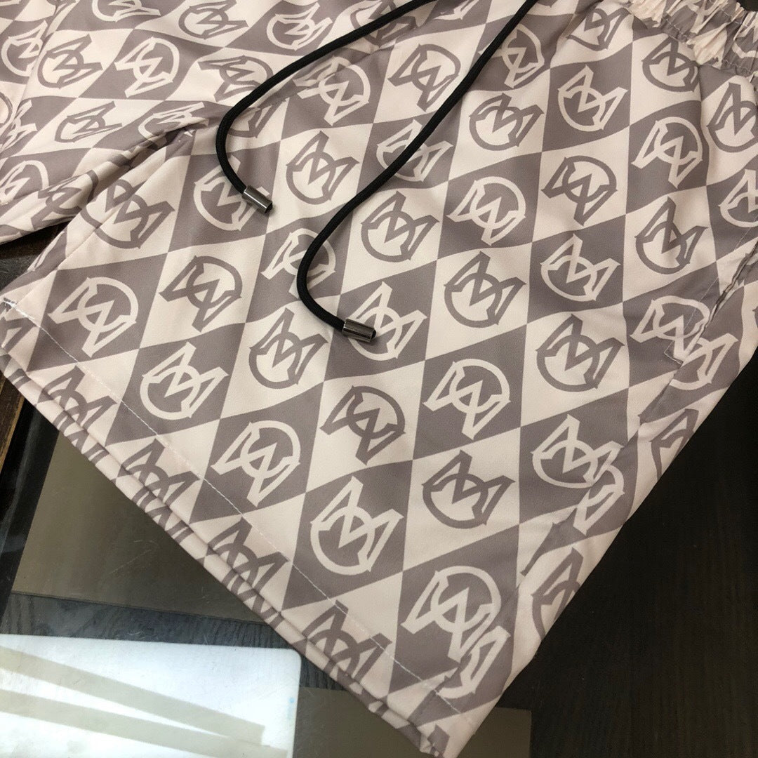 MONOGRAM PRINT SWIM SHORTS