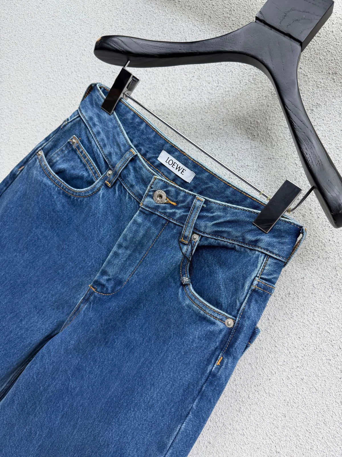 EMBOSSED LOGO RELAXED DENIM JEANS