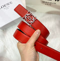 RED LEATHER BELT WITH SILVER ANAGRAM BUCKLE