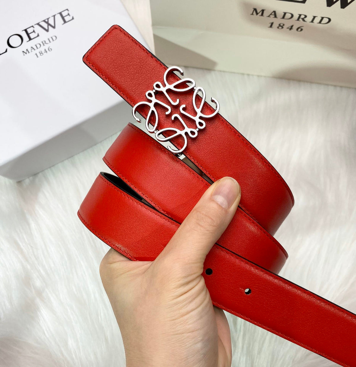 RED LEATHER BELT WITH SILVER ANAGRAM BUCKLE