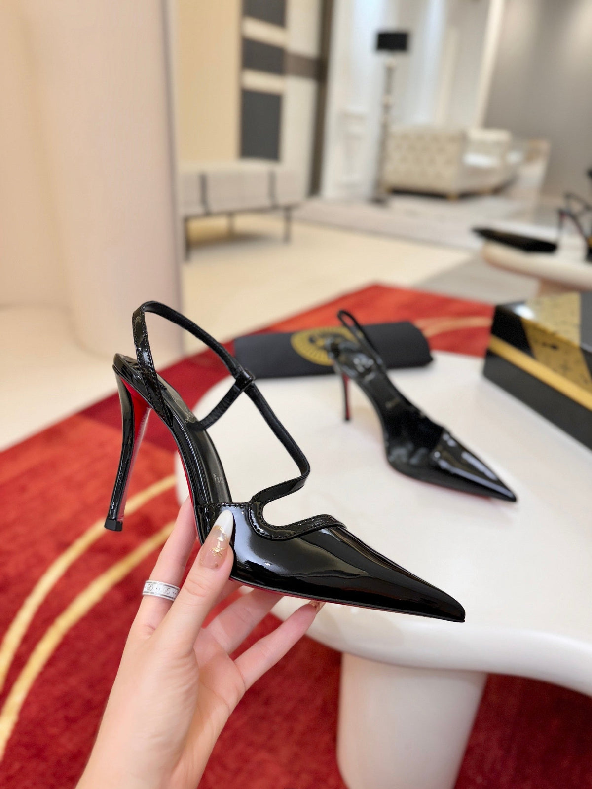BLACK PATENT STRAPPY POINTED HEELS