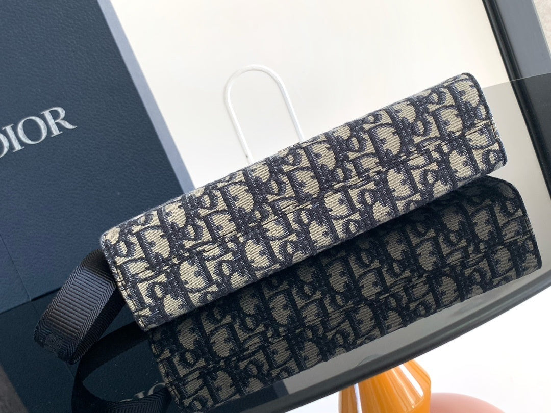 OBLIQUE CANVAS ZIP POUCH CLUTCH