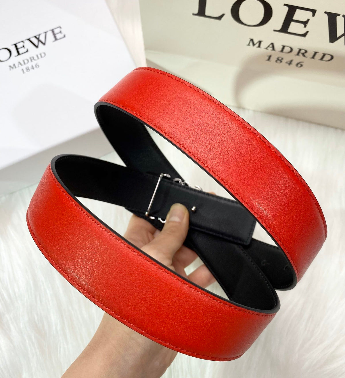 RED LEATHER BELT WITH SILVER ANAGRAM BUCKLE