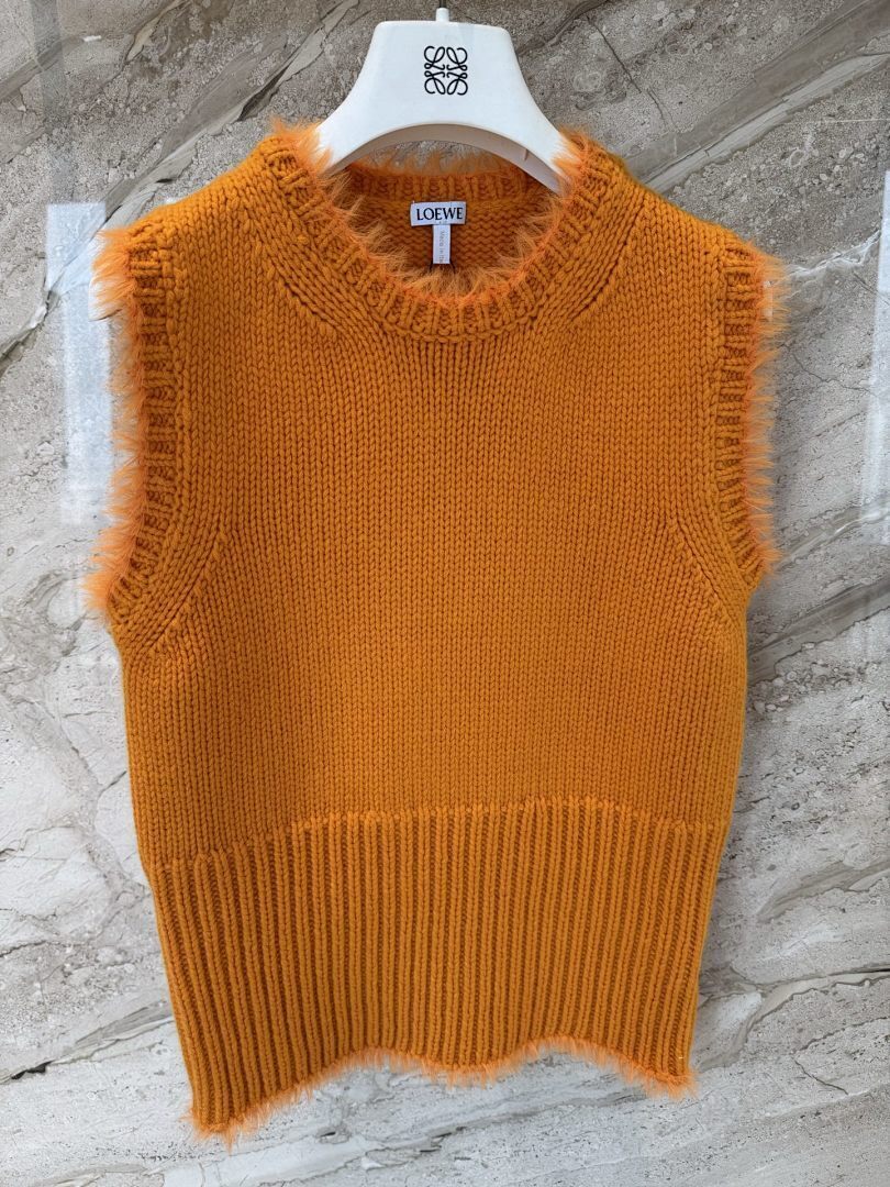 TEXTURED KNIT SLEEVELESS SWEATER