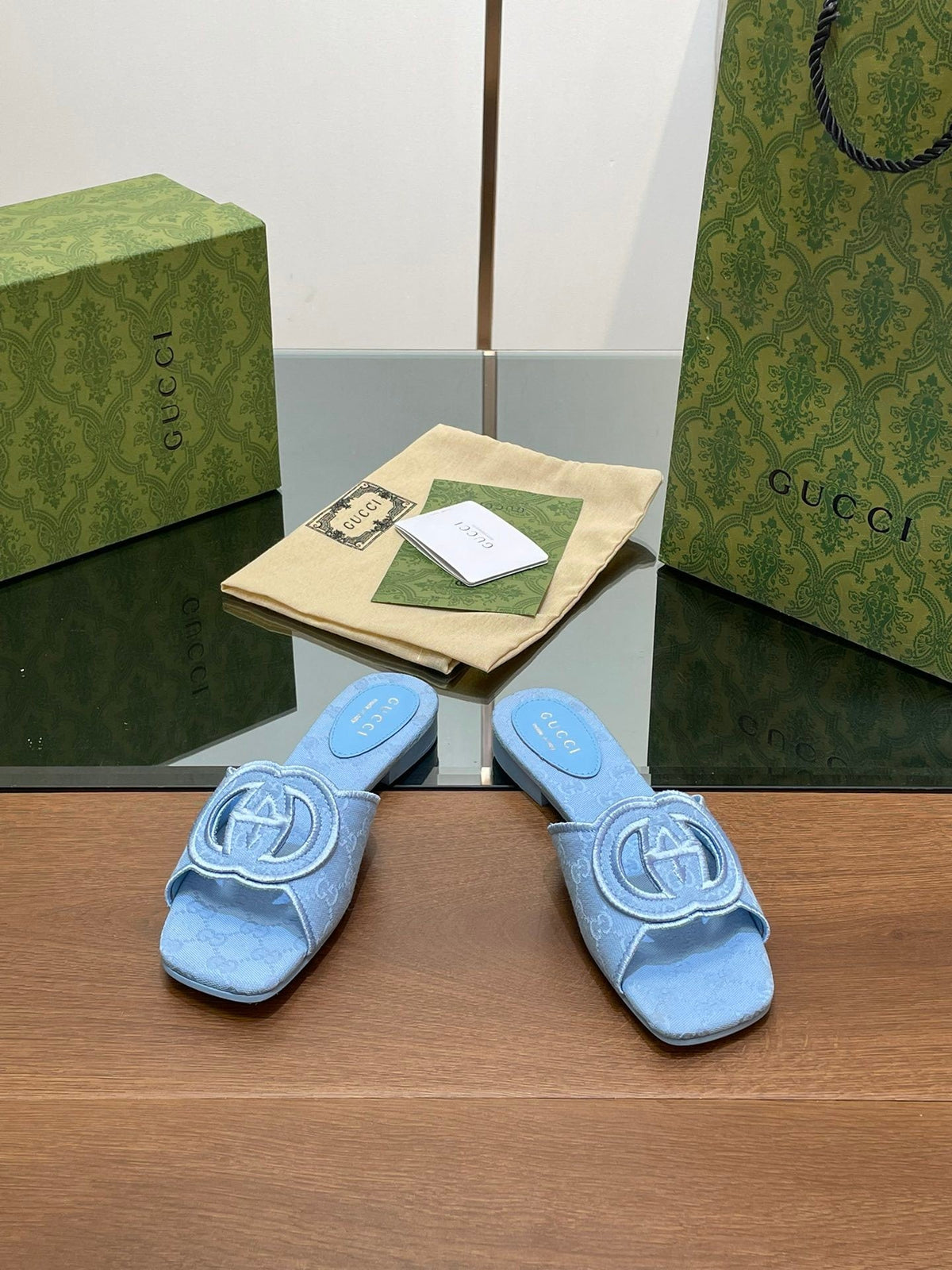 BLUE EMBOSSED LOGO SLIDES