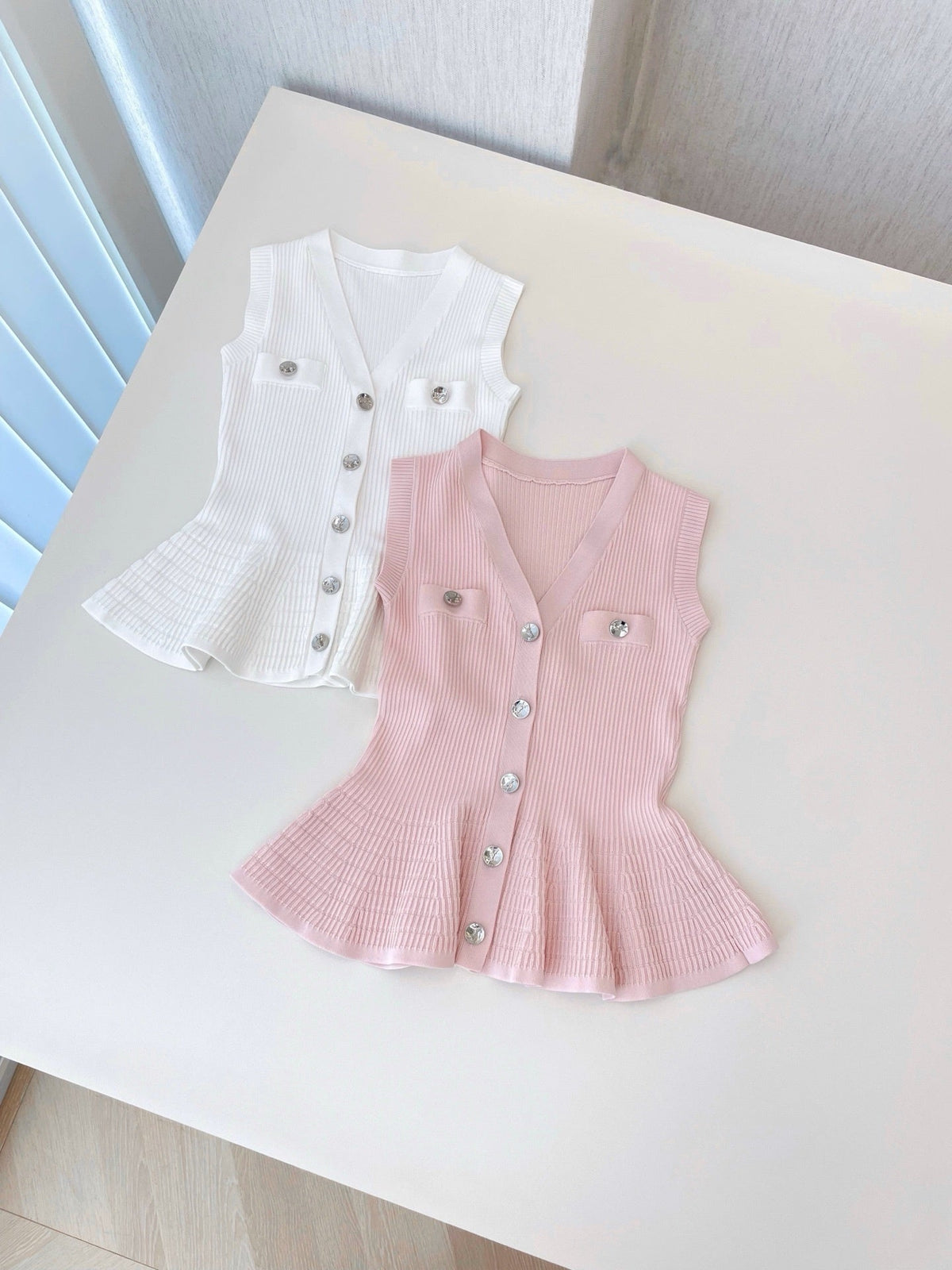 RIBBED PEPLUM KNIT TOP – BUTTON DETAIL