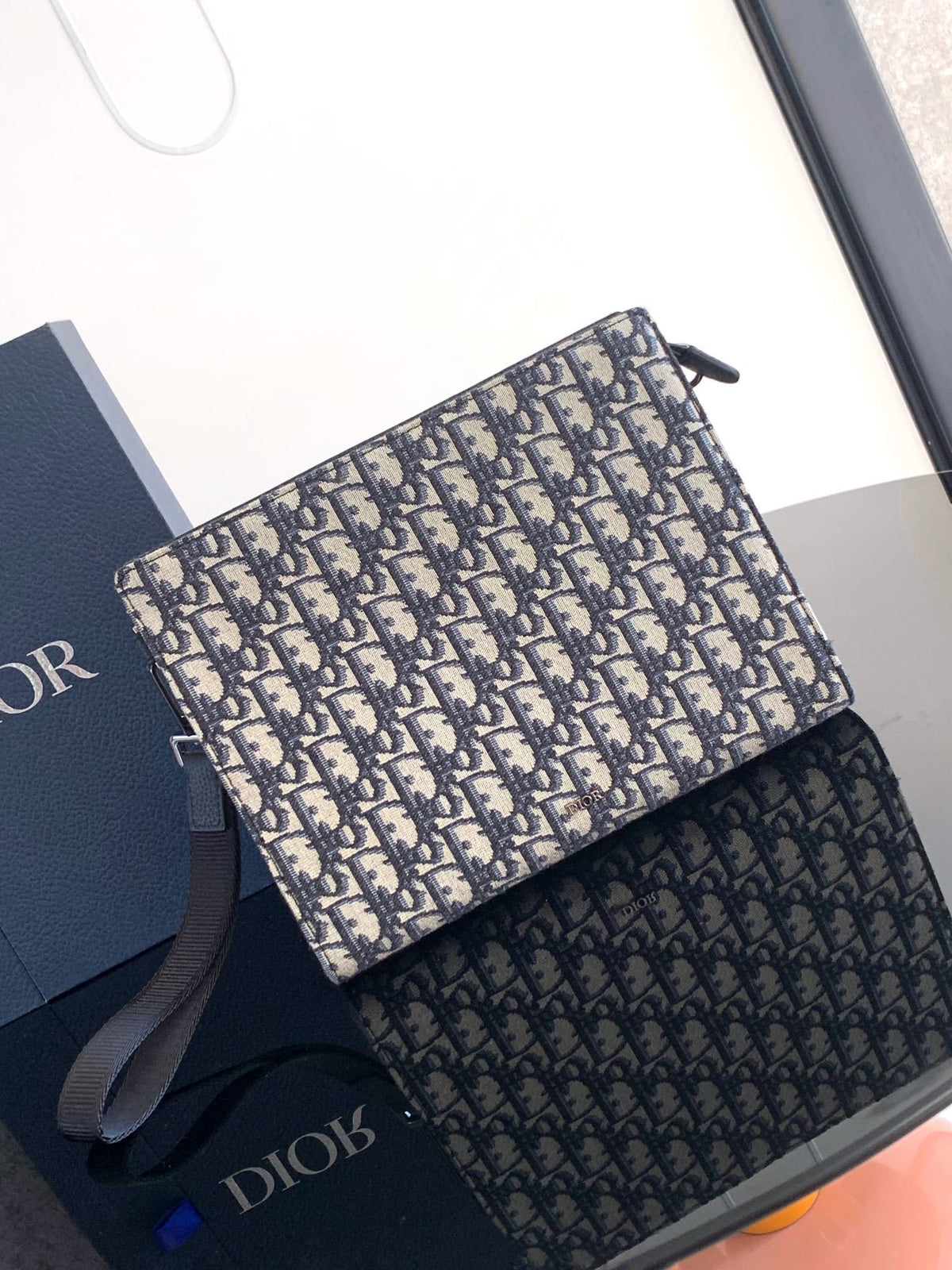 OBLIQUE CANVAS ZIP POUCH CLUTCH
