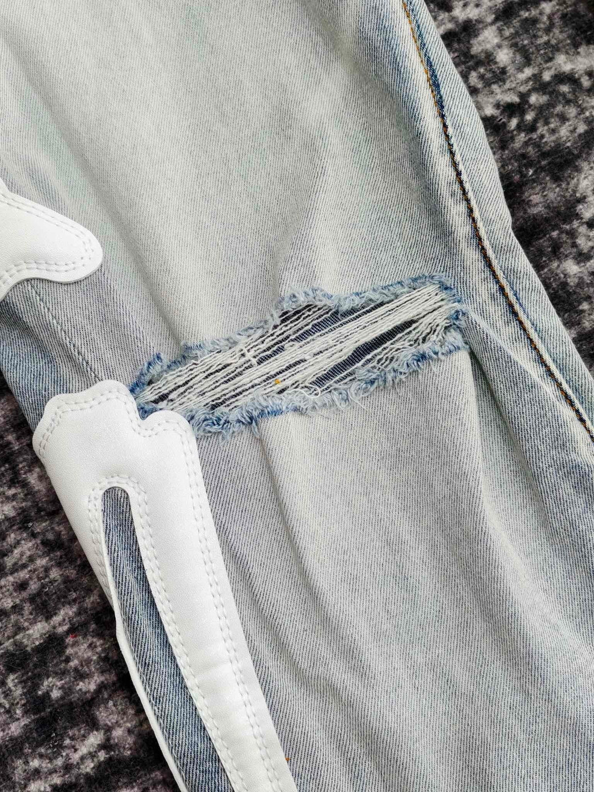 SKELETON APPLIQUÉ DISTRESSED SKINNY JEANS