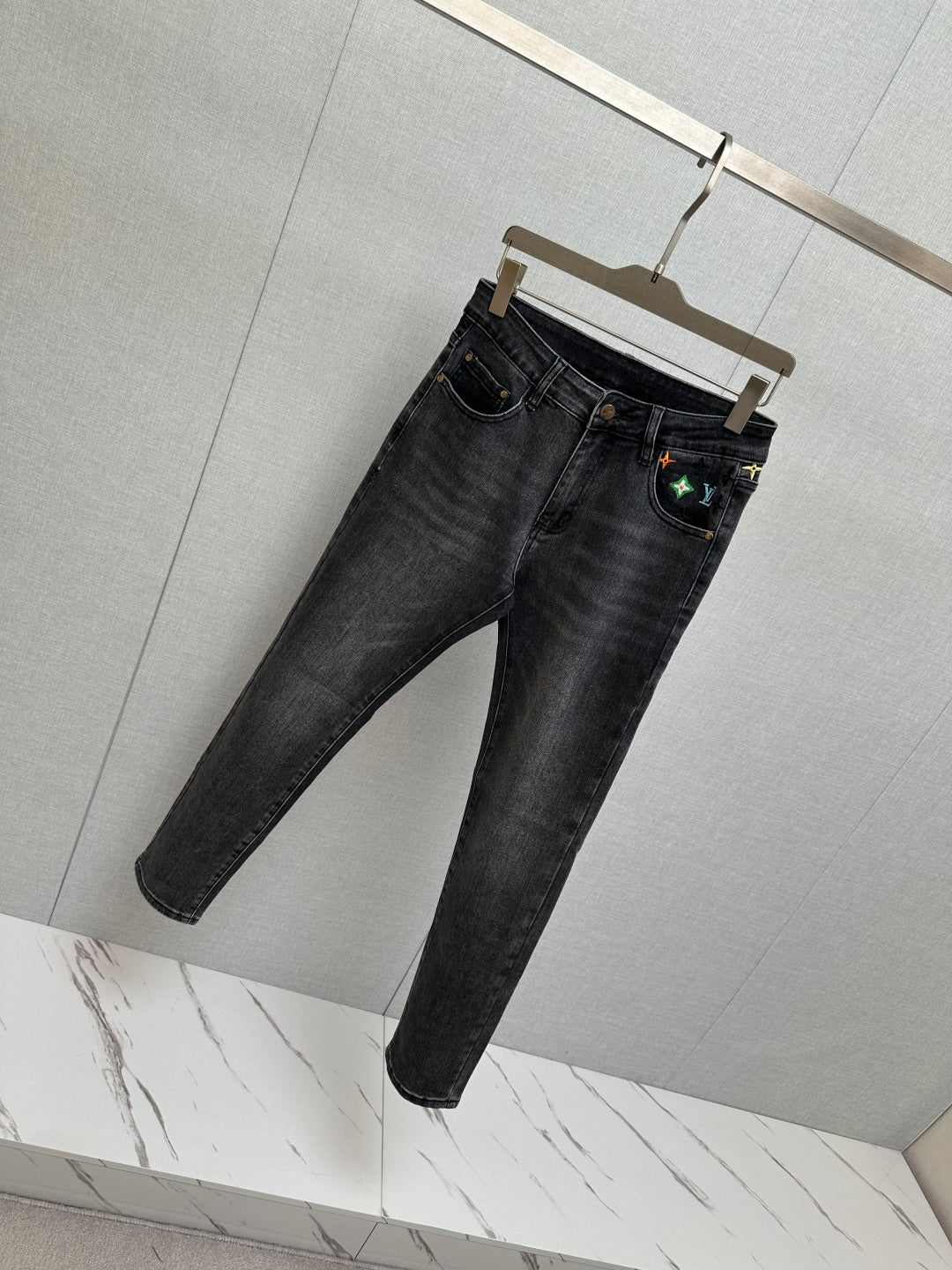 BLACK DENIM JEANS WITH EMBROIDERED BACK POCKET DETAILS