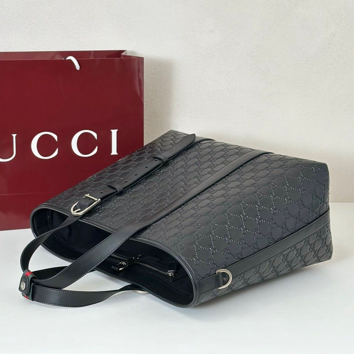 EMBOSSED LEATHER TOTE BAG