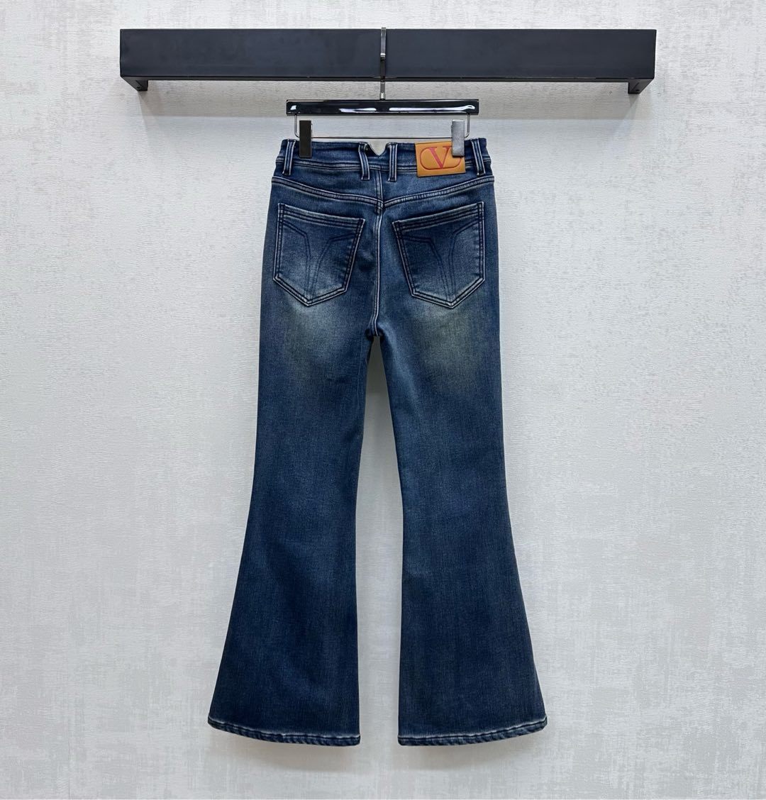 FLARED LEG VINTAGE WASH DENIM JEANS