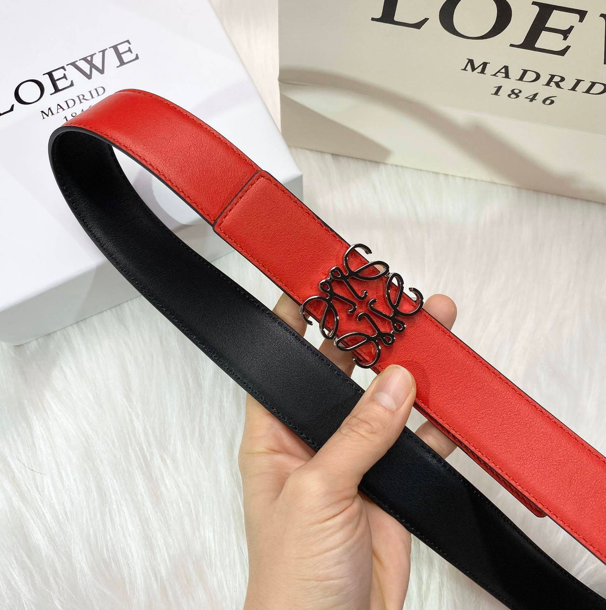 RED LEATHER BELT WITH SILVER ANAGRAM BUCKLE