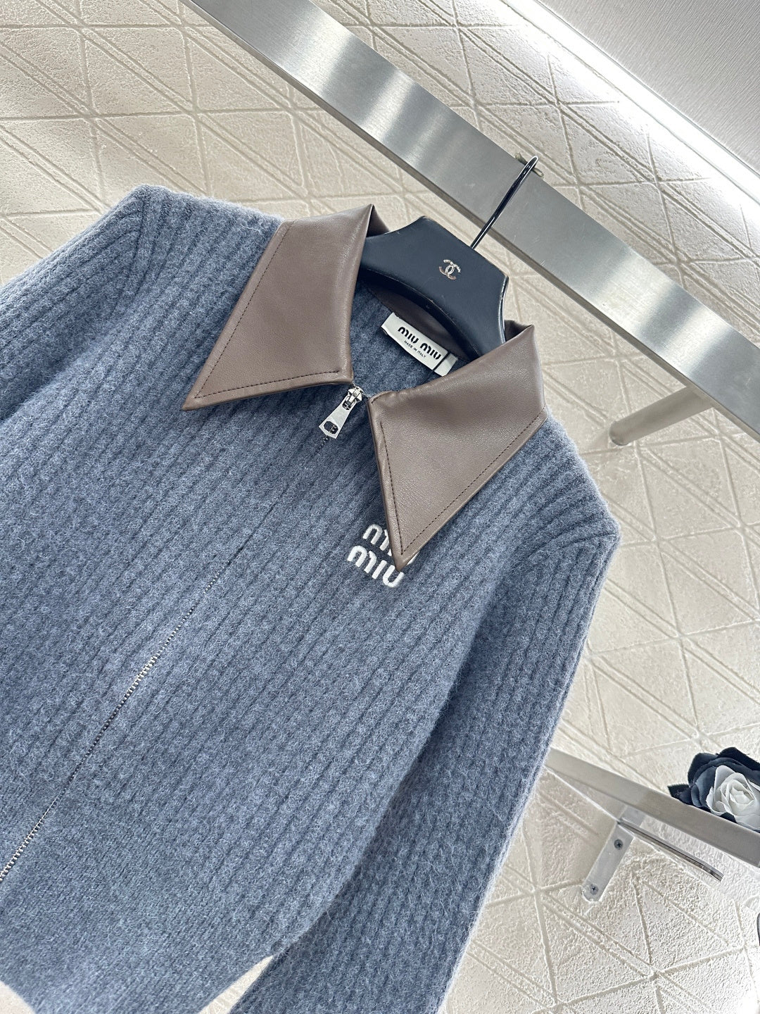ZIP-UP RIBBED KNIT SWEATER