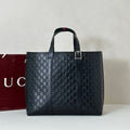 EMBOSSED LEATHER TOTE BAG