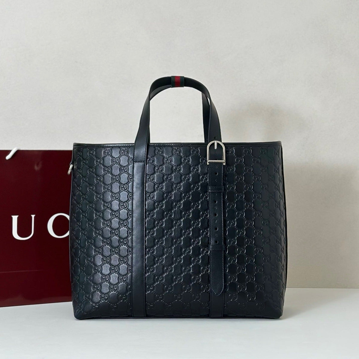 EMBOSSED LEATHER TOTE BAG