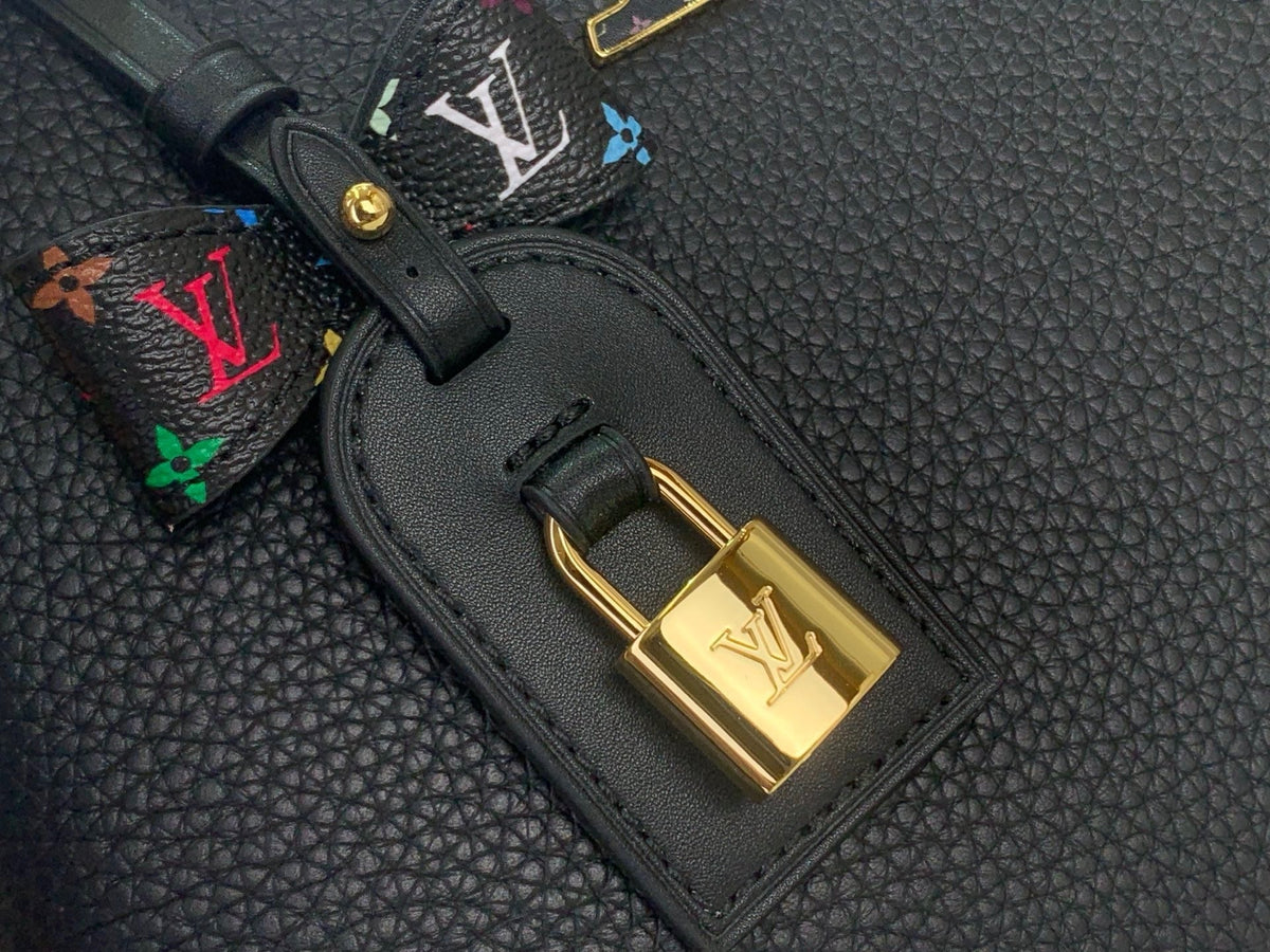 ELEGANT TOP HANDLE STATEMENT BAG