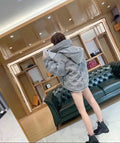EMBOSSED MONOGRAM HOODED PUFFER JACKET