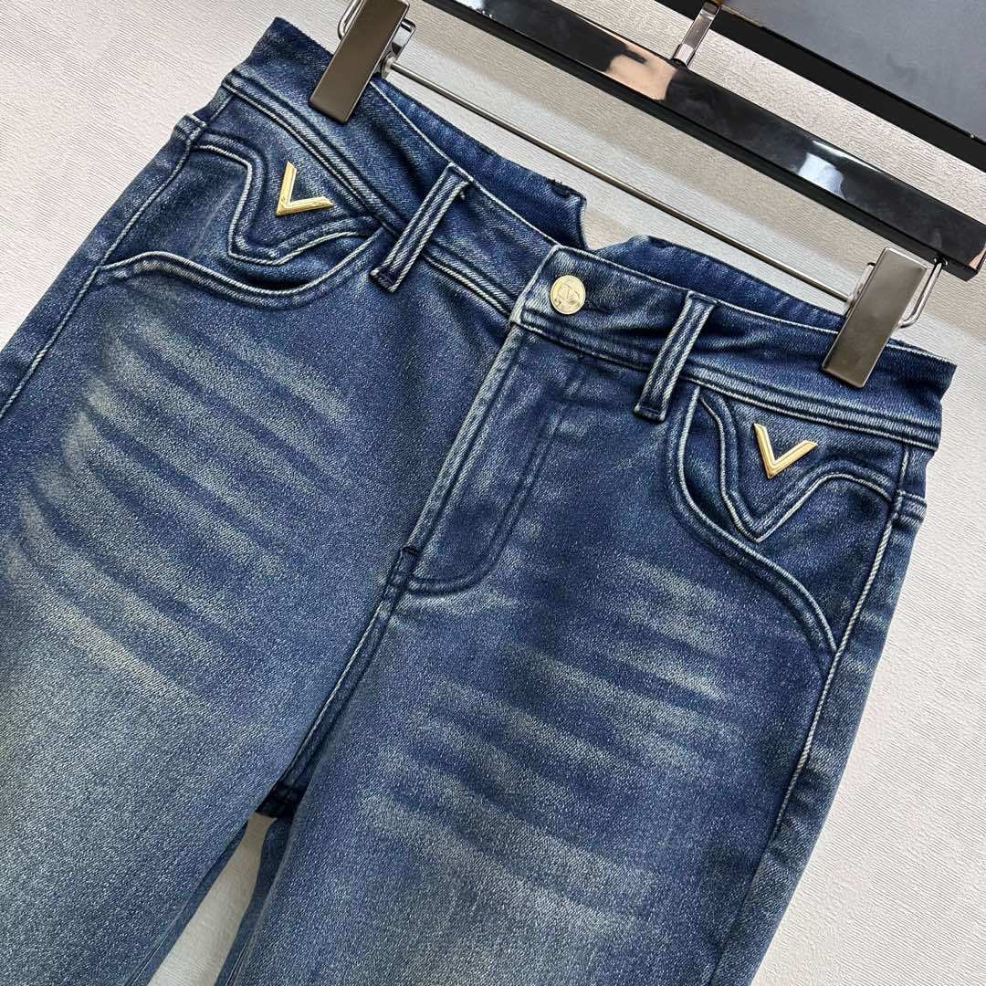 FLARED LEG VINTAGE WASH DENIM JEANS