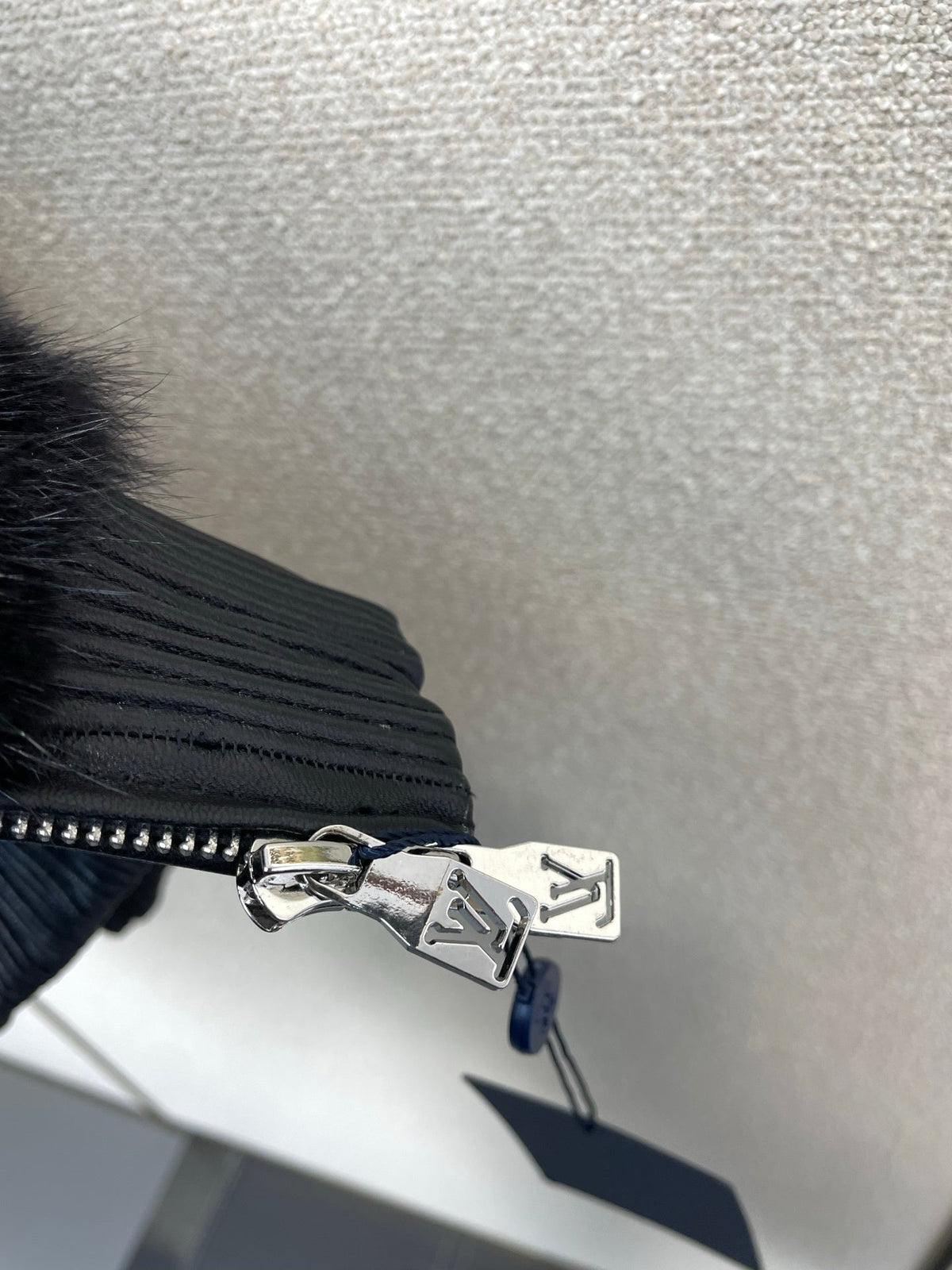 BLACK FAUX FUR HOODED JACKET WITH CONTRAST PATTERN