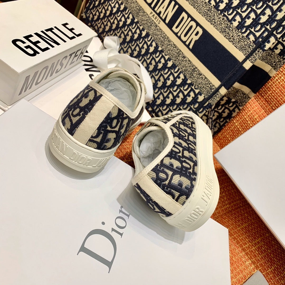 OBLIQUE MONOGRAM LOW-TOP CANVAS SNEAKERS
