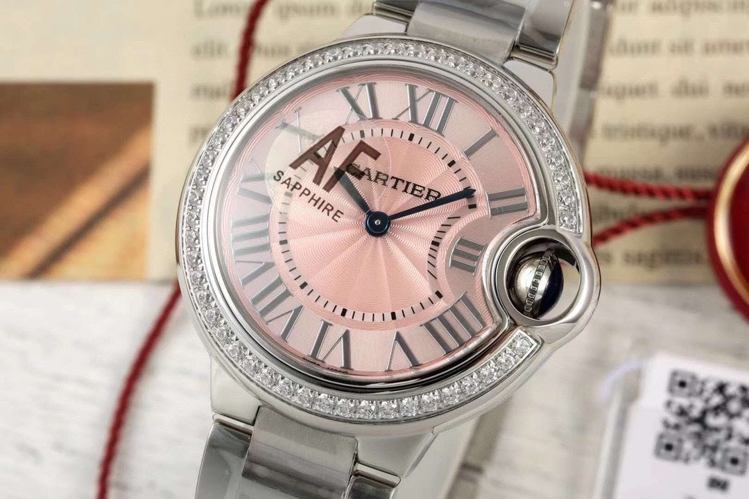 SILVER-TONE ROUND DIAL WATCH WITH PINK FACE