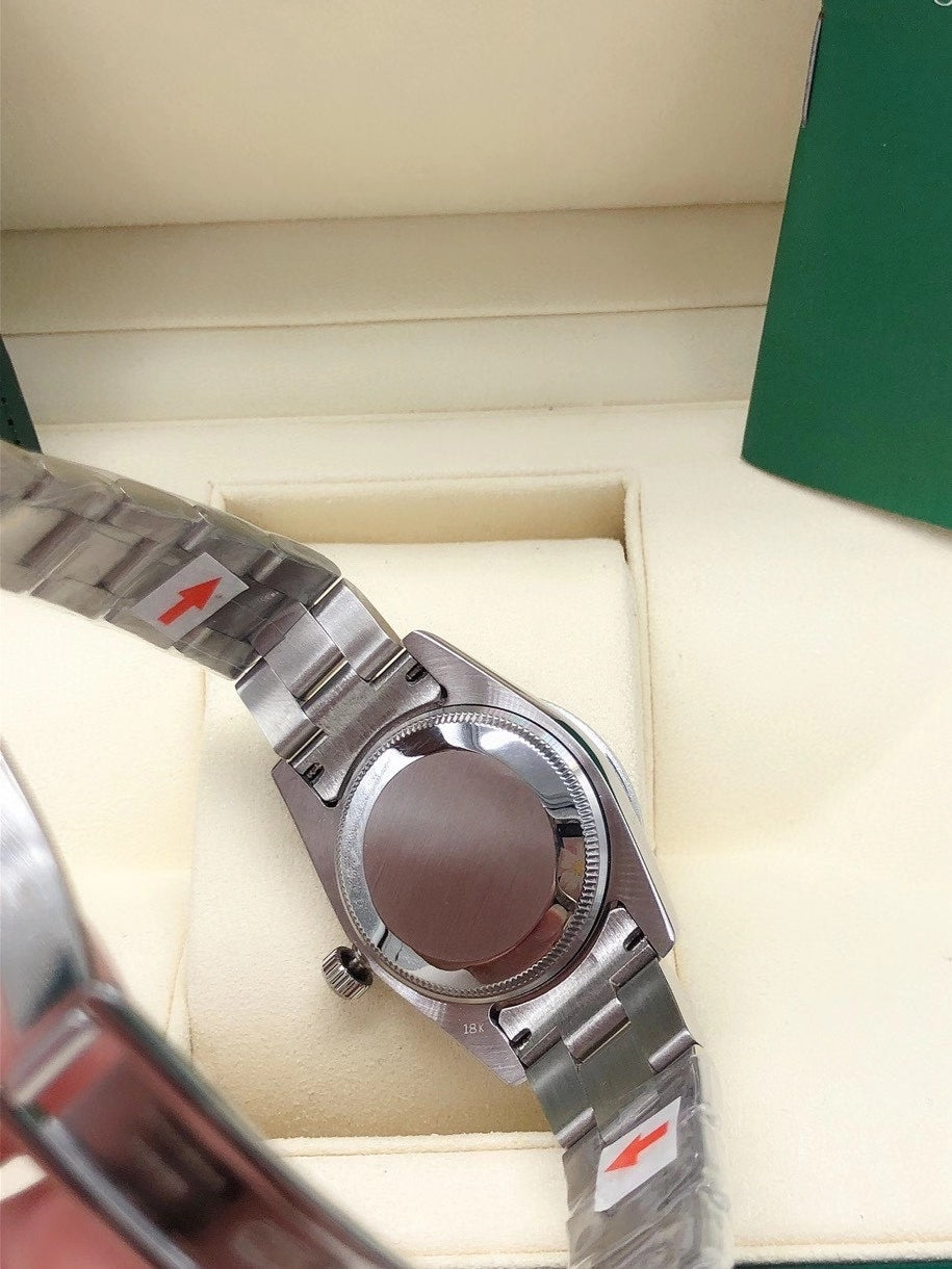PINK DIAL STAINLESS STEEL DATE WATCH WITH FLUTED BEZEL