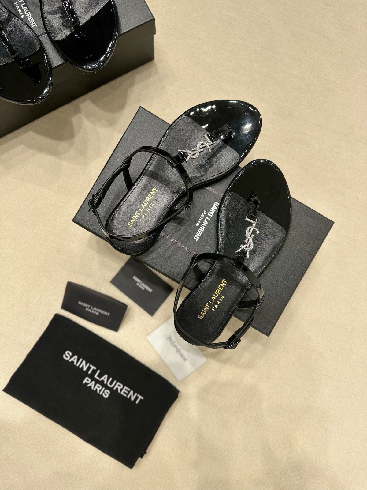 BLACK STRAPPY FLAT SANDALS WITH CRYSTAL DETAIL