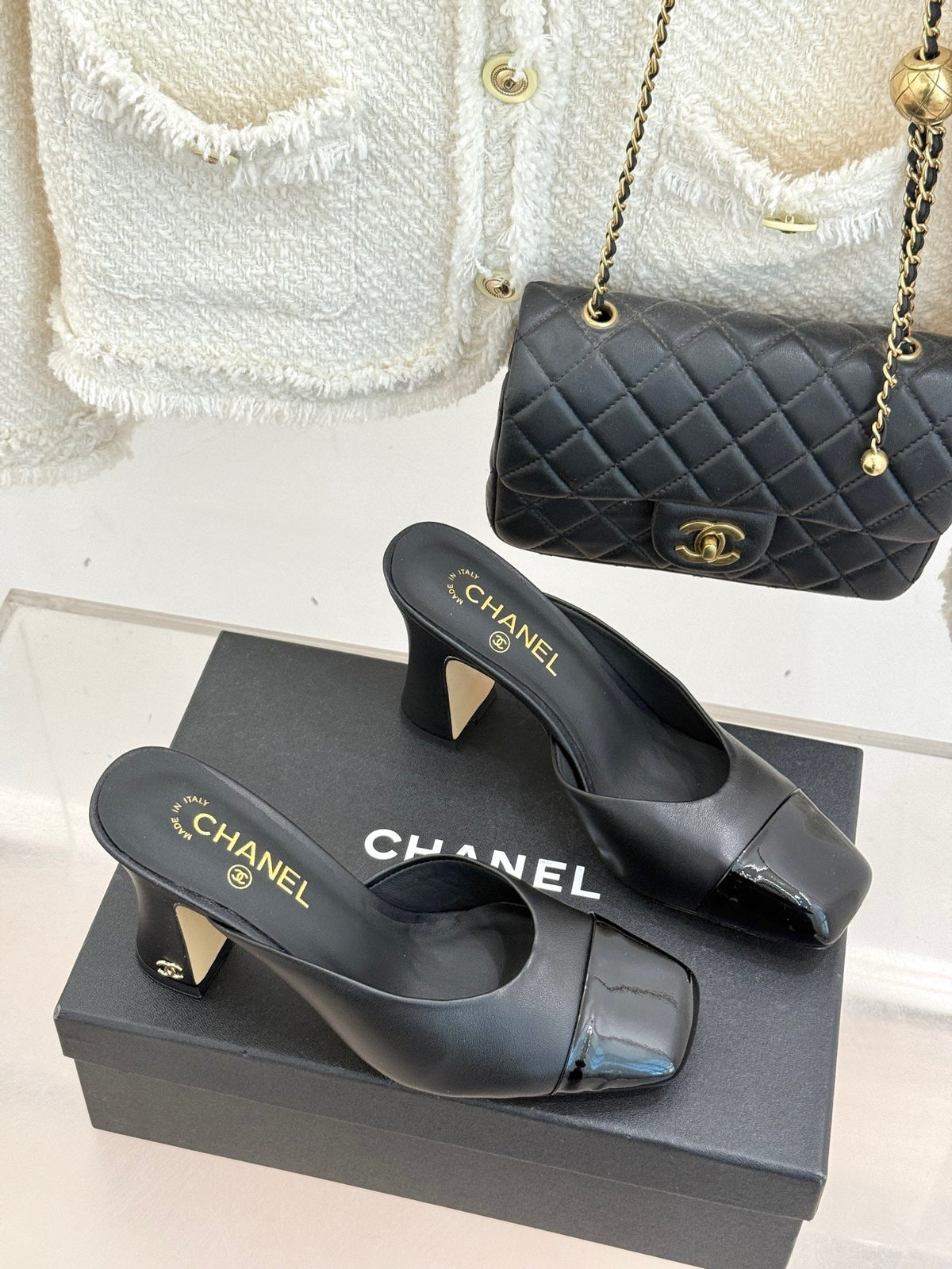 BLACK LEATHER CAP-TOE MULE HEELS WITH GOLD DETAIL
