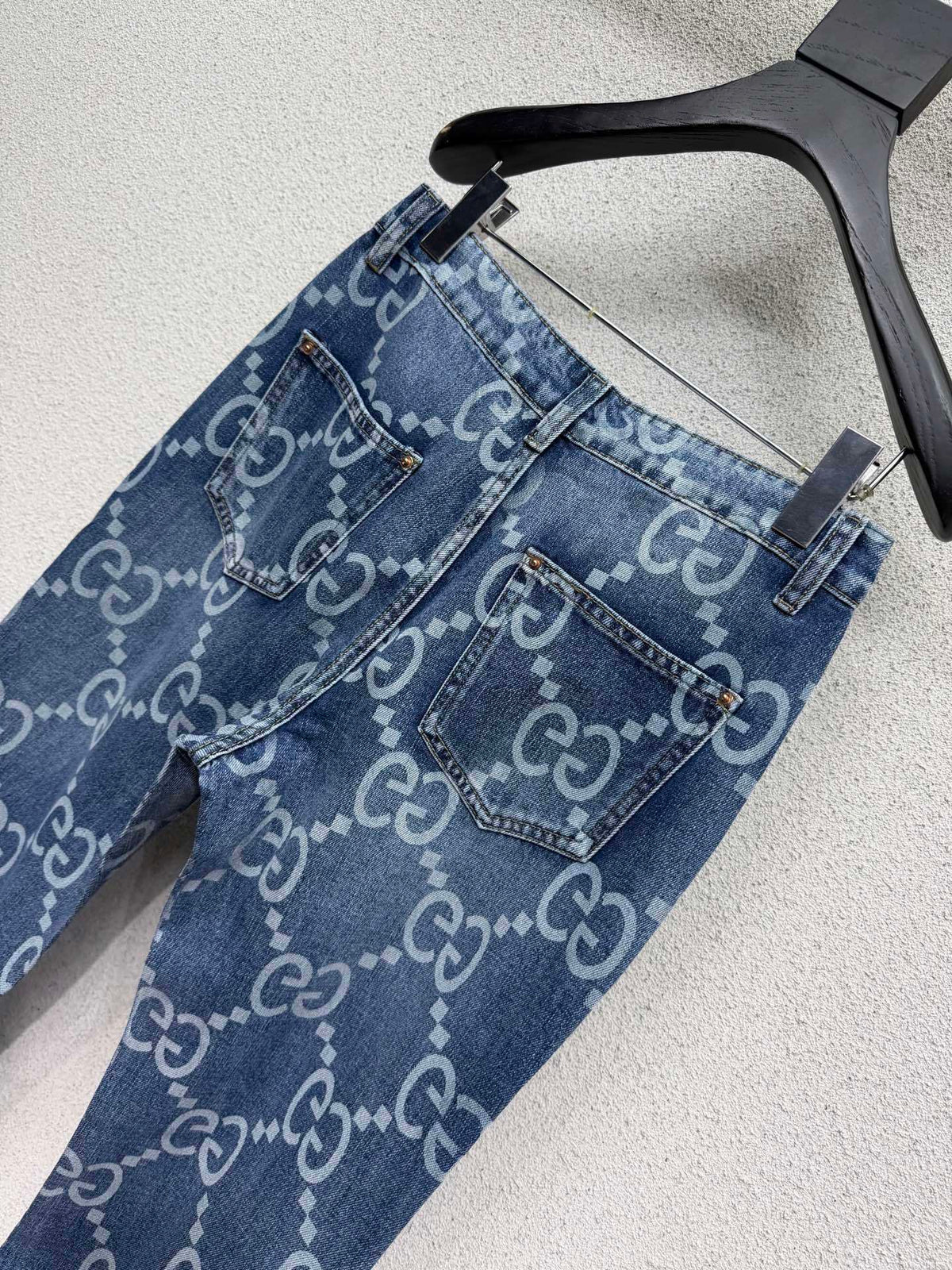 MONOGRAM PRINT FLARED DENIM JEANS