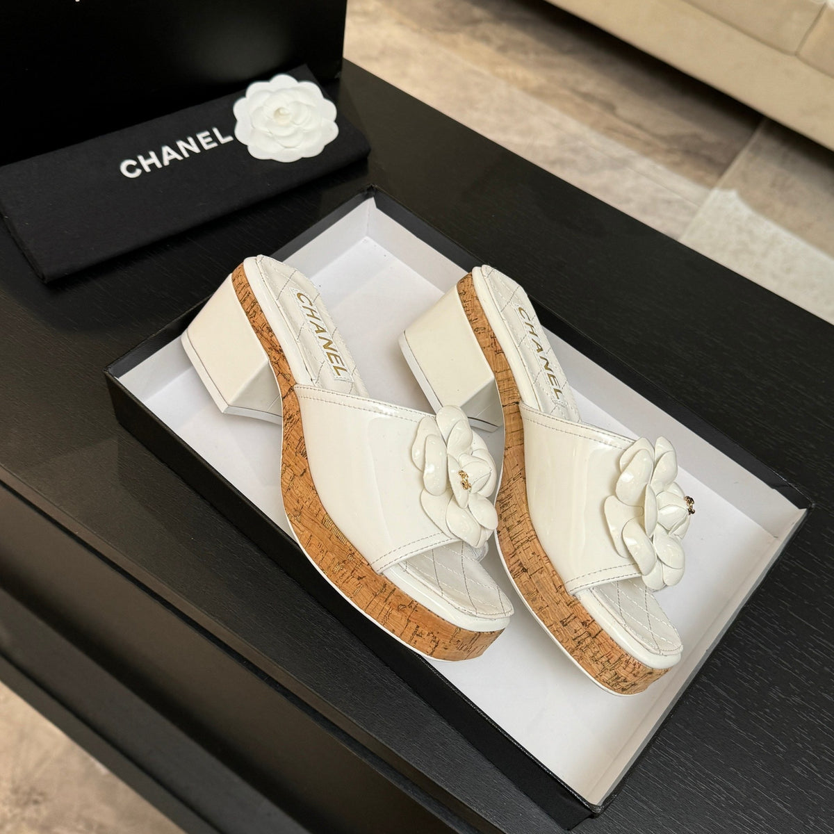IVORY QUILTED PLATFORM SLIDE SANDALS WITH CAMELLIA DETAIL