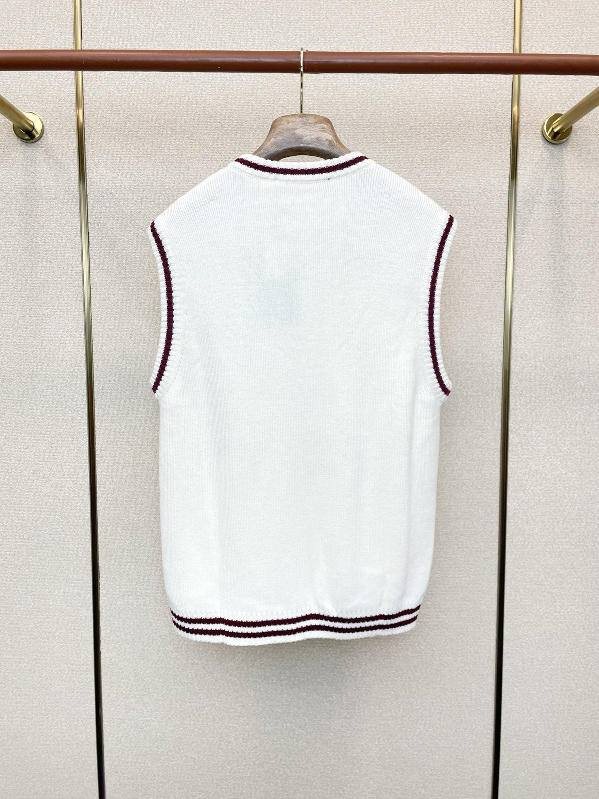 V-NECK KNIT VEST WITH EMBROIDERED CREST