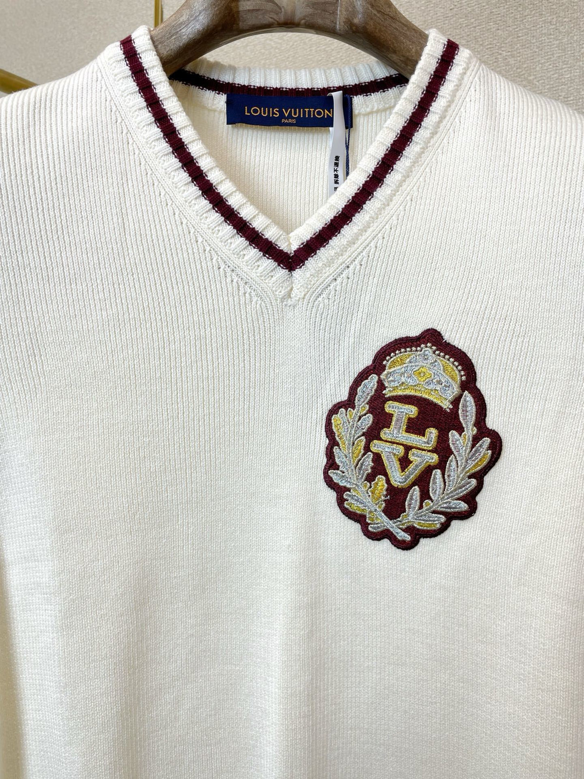 V-NECK KNIT VEST WITH EMBROIDERED CREST