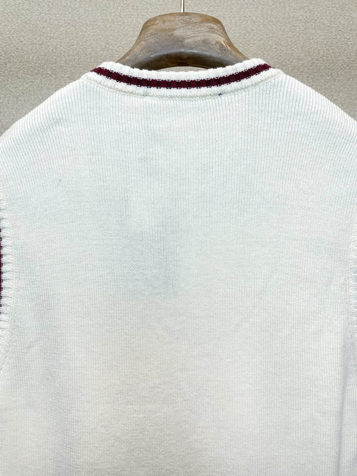 V-NECK KNIT VEST WITH EMBROIDERED CREST