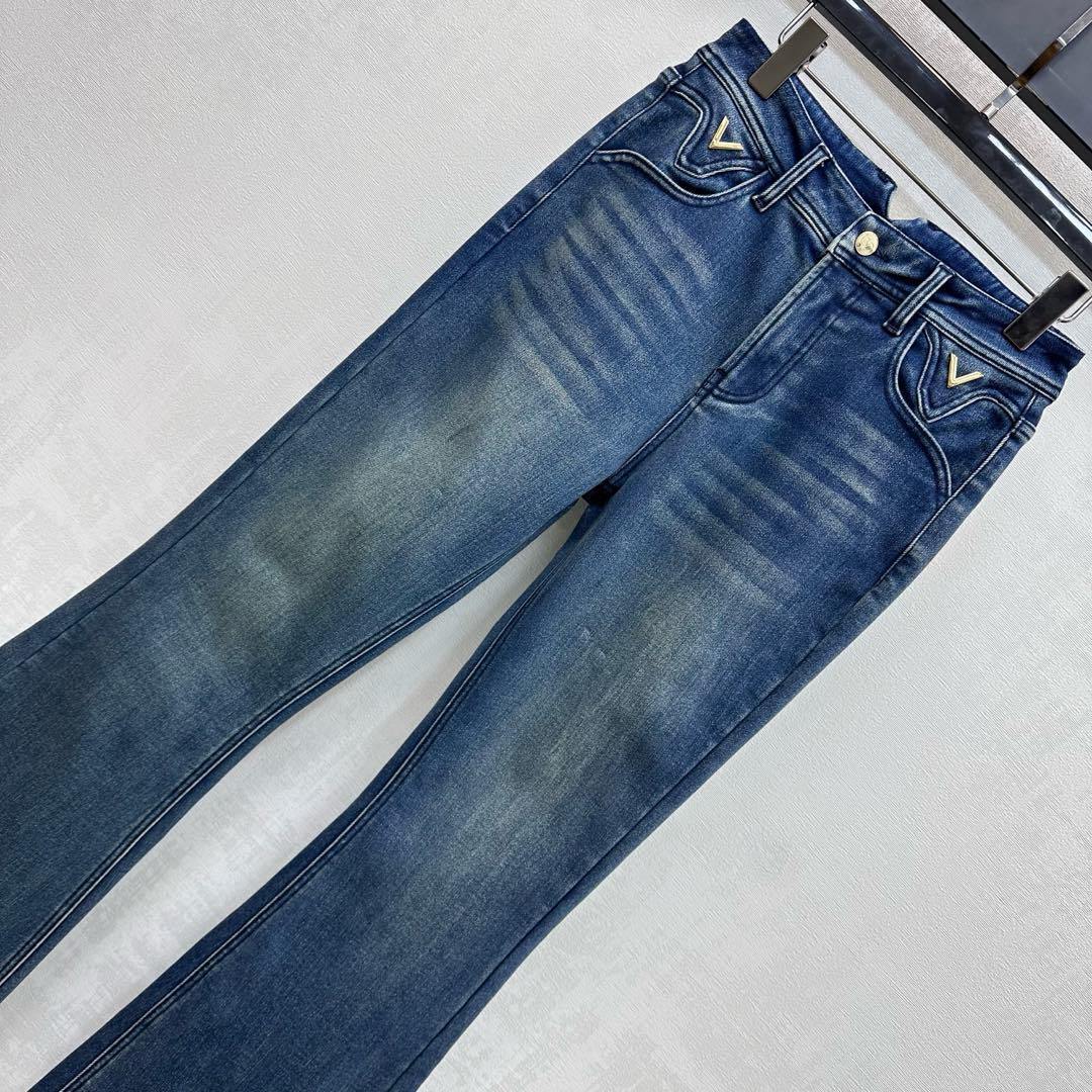 FLARED LEG VINTAGE WASH DENIM JEANS
