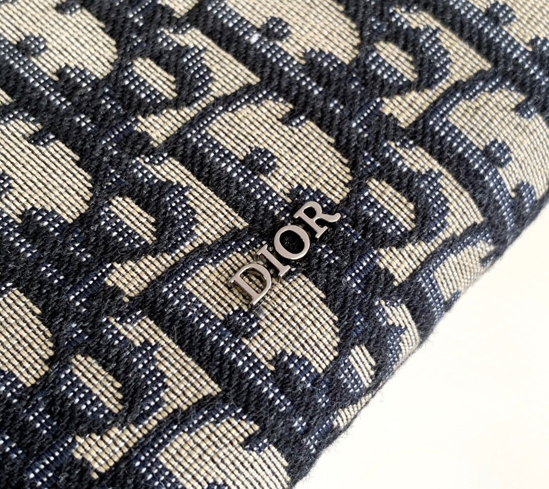 OBLIQUE CANVAS ZIP POUCH CLUTCH